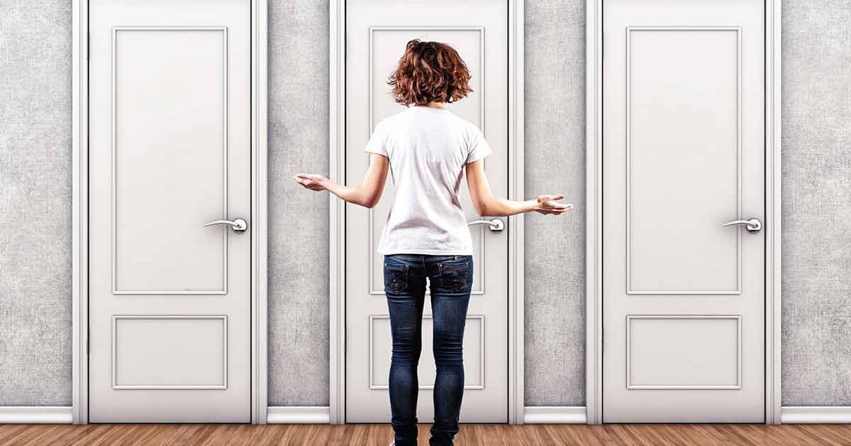 Woman-with-doors-to-unknown.jpg