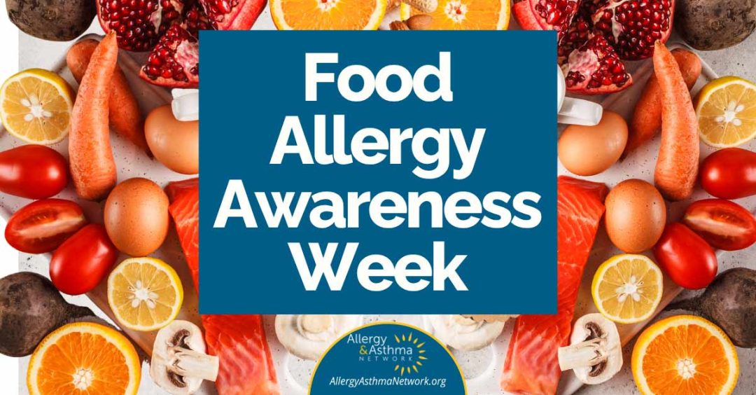 Food Allergy Awareness Week 1 A blue box with “Food Allergy Awareness Week” written in white text, surrounded by common allergenic foods like eggs, fish, nuts, tomatoes, citrus, mushrooms, and pomegranate halves. Allergy & Asthma Network logo appears below.