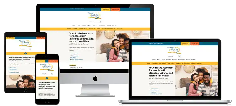 A website titled “Allergy and Asthma Network” displayed on a smartphone, tablet, laptop, and desktop screen, showing its responsive design. The homepage features a smiling couple and accessible navigation menus.