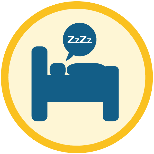 A blue icon of a person sleeping in bed with a speech bubble showing "ZzZzZ", inside a yellow-bordered circle on a light background.